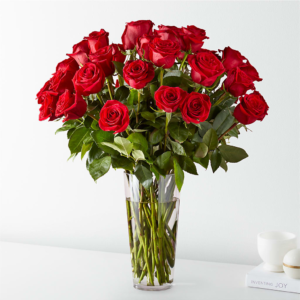 Three Dozen Red Roses, Vase filled with red roses.