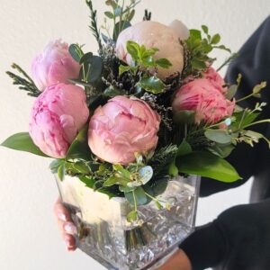 Bi-Color Pink Peonies Bouquet in a square glass vase with greenery