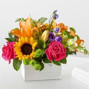 Best Day Box Bouquet featuring sunflowers, orange lilies, pink roses, and vibrant blooms.