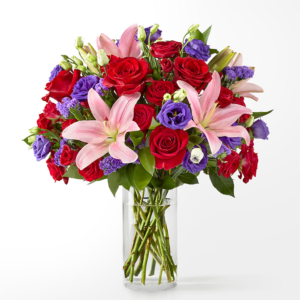 Royal radiance bouquet, a dazzling assortment features a majestic blend of premium roses and fragrant lilies