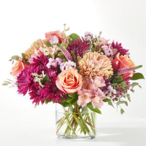 Berry Sorbet Bouquet, A vibrant bouquet of roses, chrysanthemums, and lilies in a clear glass vase.