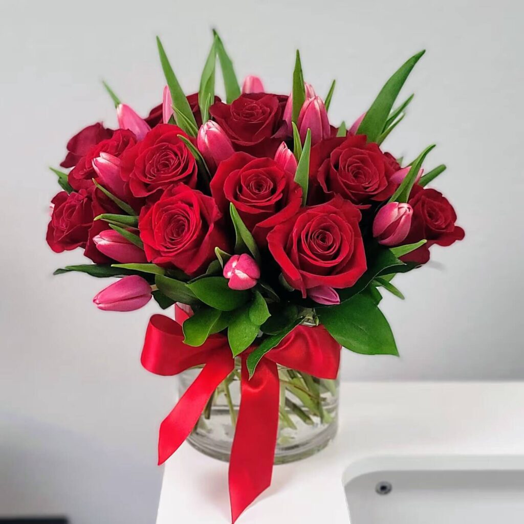 Sincere Sentiments Bouquet, Vibrant bouquet of red roses and tulips.