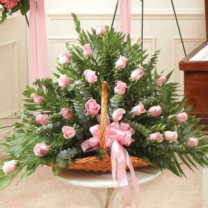 Pink rose sympathy fireside basket with lush greenery