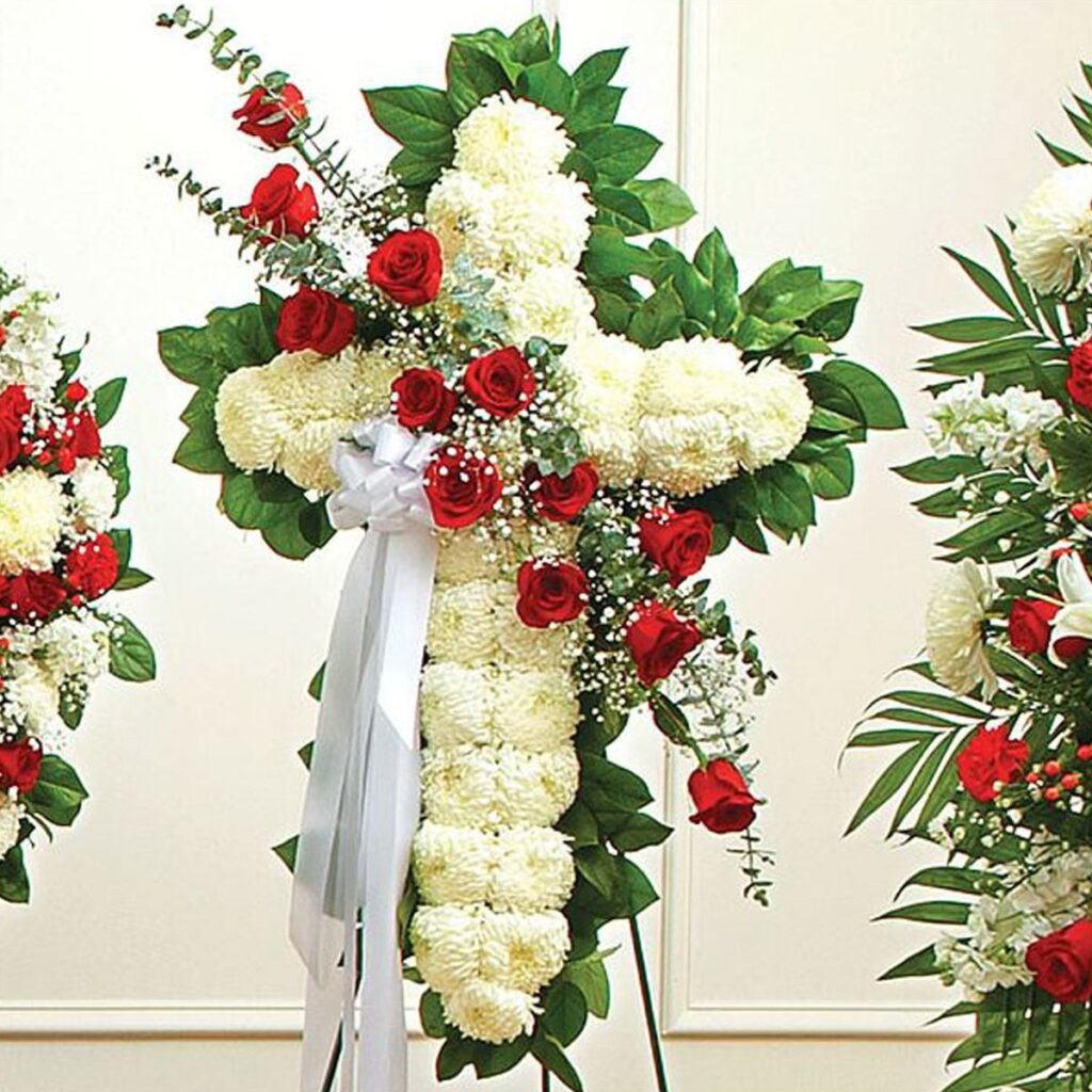 Floral cross with red roses decoration
