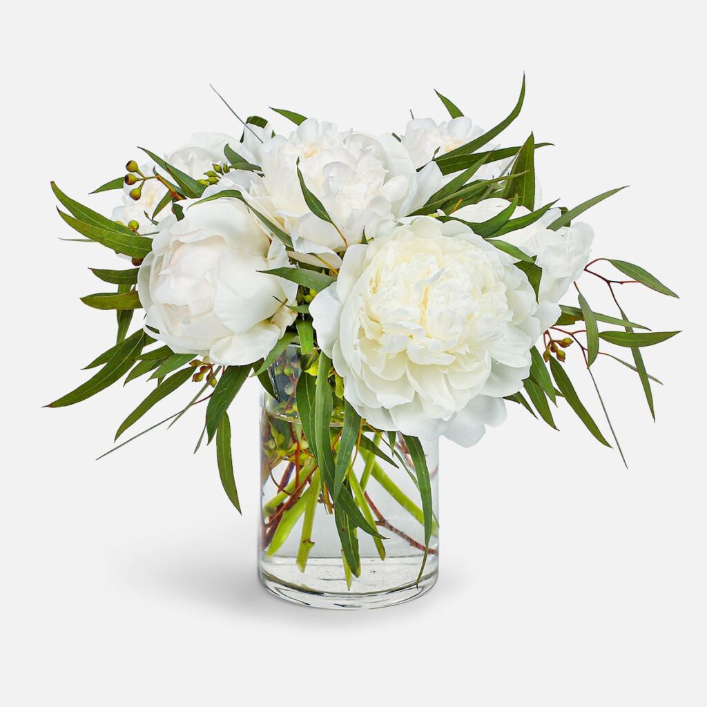 Blossom Reverie bouquet with seasonal blooms, eucalyptus, and greenry.