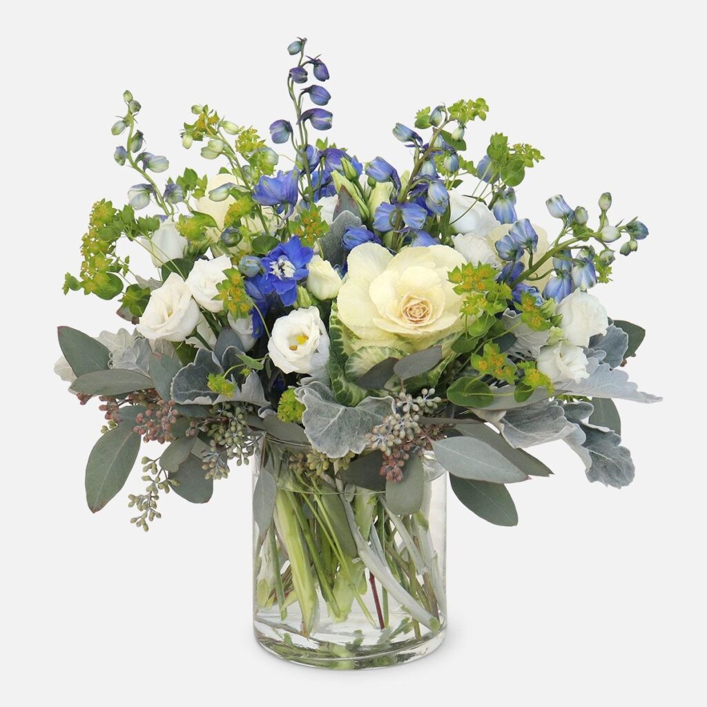 Azure Facet Bouquet, Blue and white floral arrangement with delphiniums in a glass cylinder vase