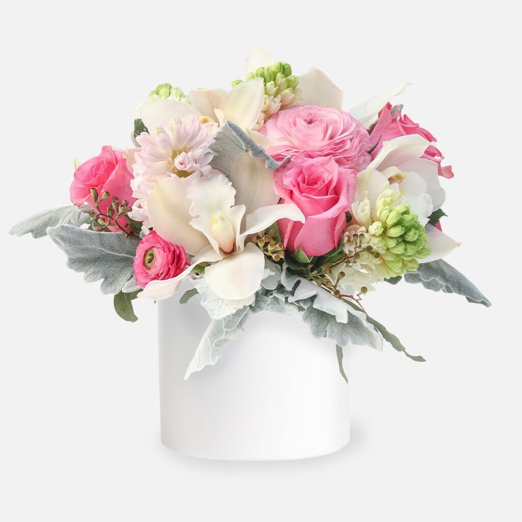 Petite Romance Bouquet, Colorful floral arrangement in white vase.
