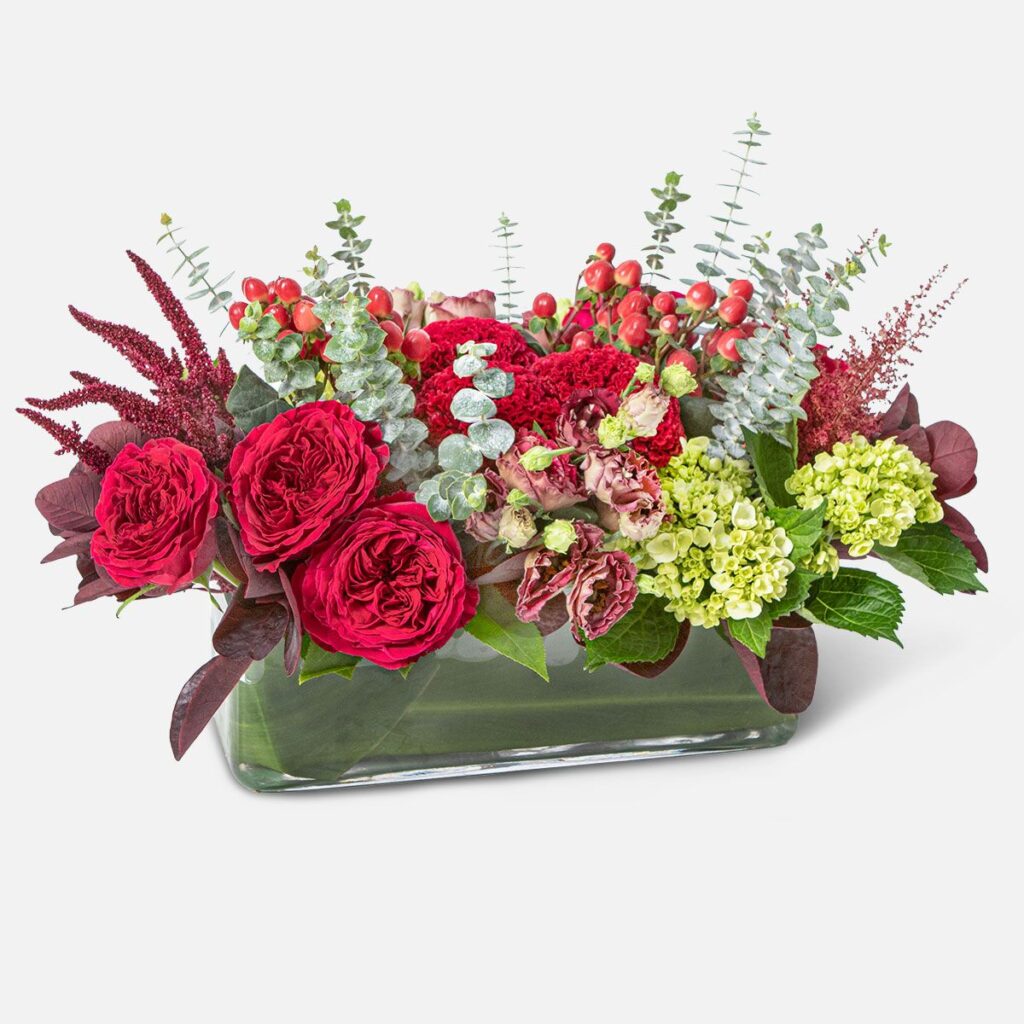Velvet Embers Centerpiece, Red and green floral centerpiece in a glass vase